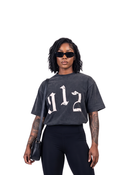 Godspeed grey oversized graphic t shirt at unseen grail. local brands south africa. streetwear. men and women. studio image front female model. galxboy, bantu, represent