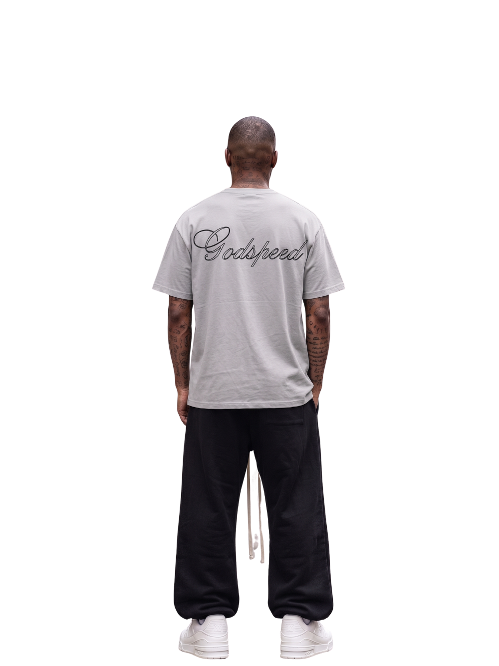 Godspeed white oversized graphic t shirt at unseen grail. local brands south africa. streetwear. men and women. studio image behind male model full outfit. galxboy, bantu, nike