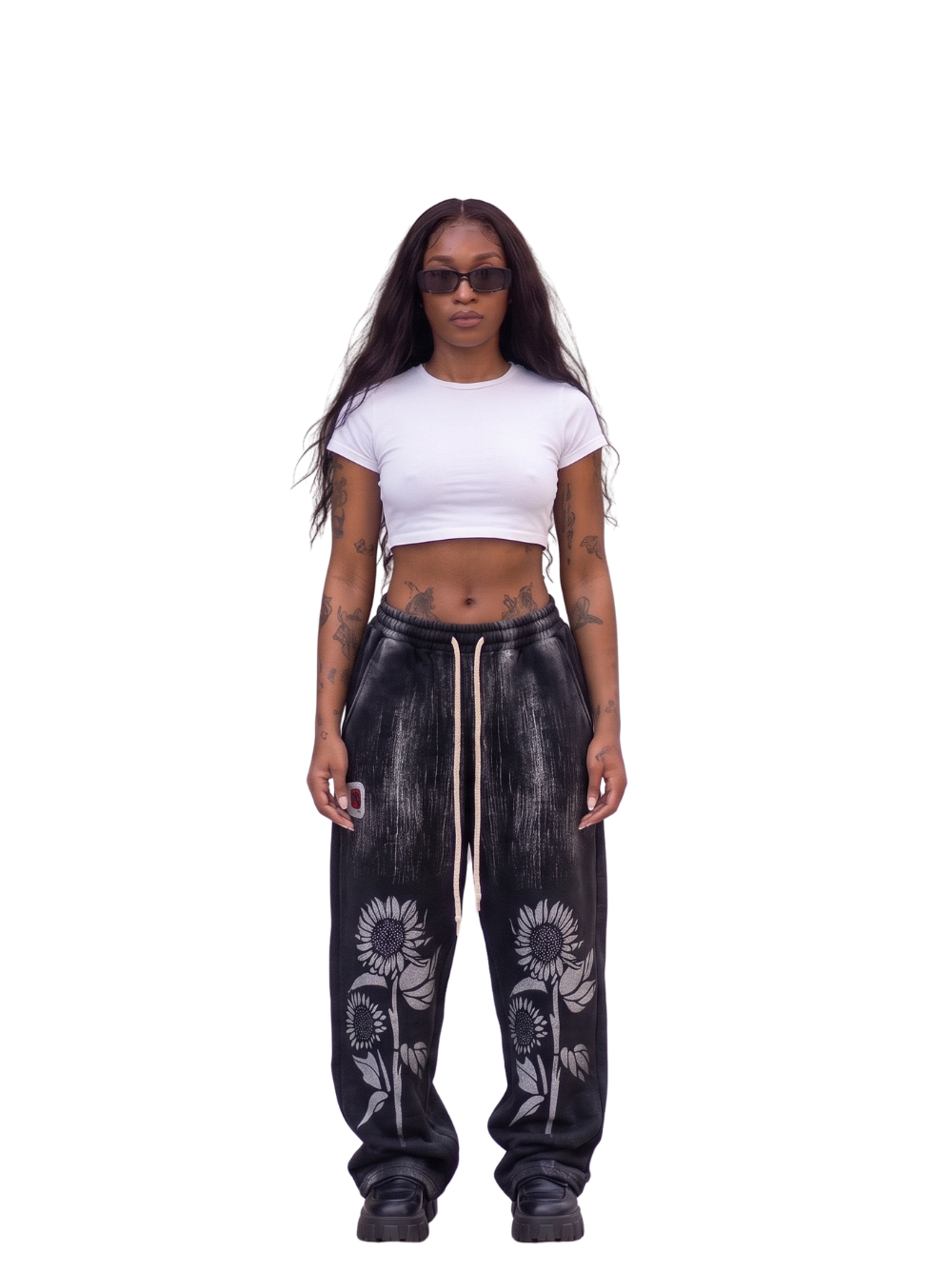 Hustle gang_black_loose_sweatpants shirt_at_unseen_grail._local_brands_south_africa._streetwear._men_and_women.galxboy_bantu. Female model front shot full out 