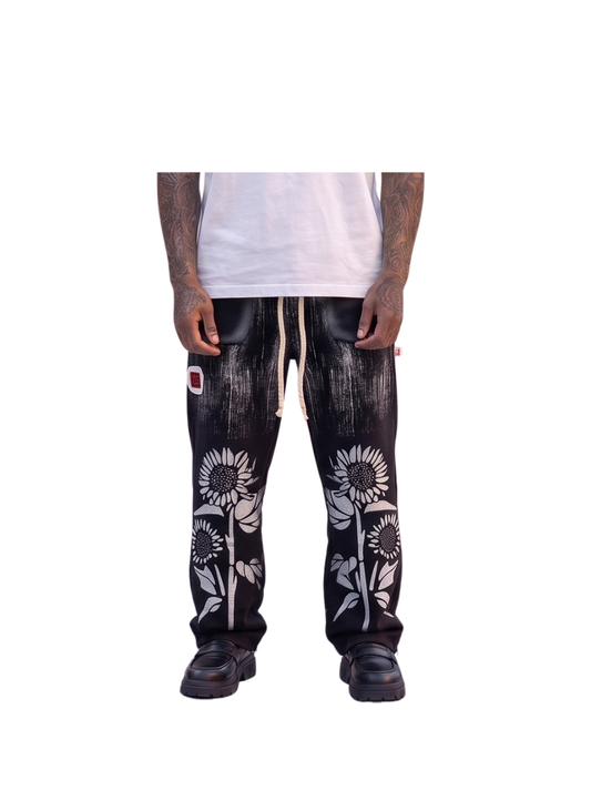 Hustle gang_black_loose_sweatpants shirt_at_unseen_grail._local_brands_south_africa._streetwear._men_and_women.galxboy_bantu. Male model front shot close up