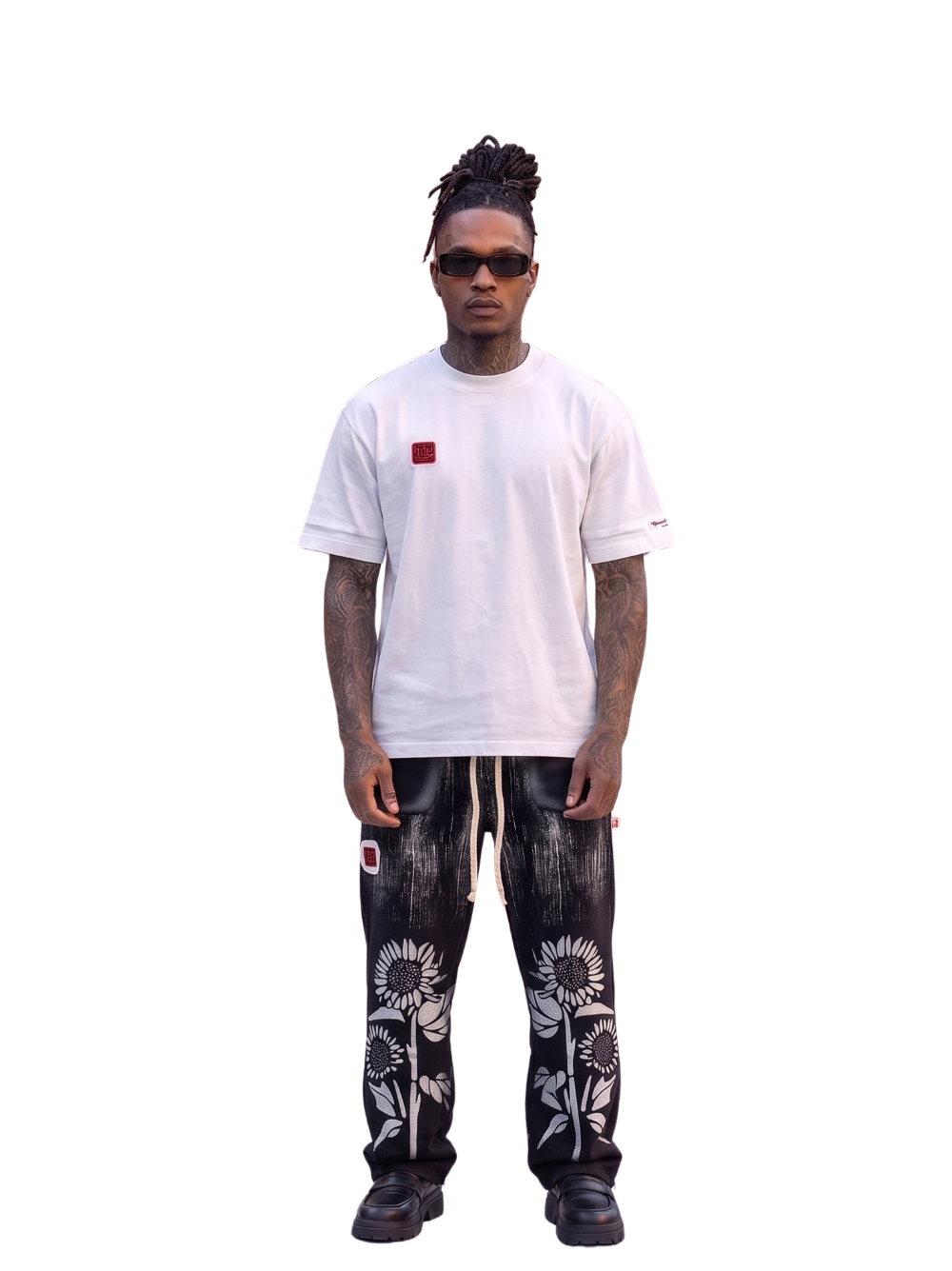 Hustle gang_black_loose_sweatpants shirt_at_unseen_grail._local_brands_south_africa._streetwear._men_and_women.galxboy_bantu. Male model front shot full outfit 