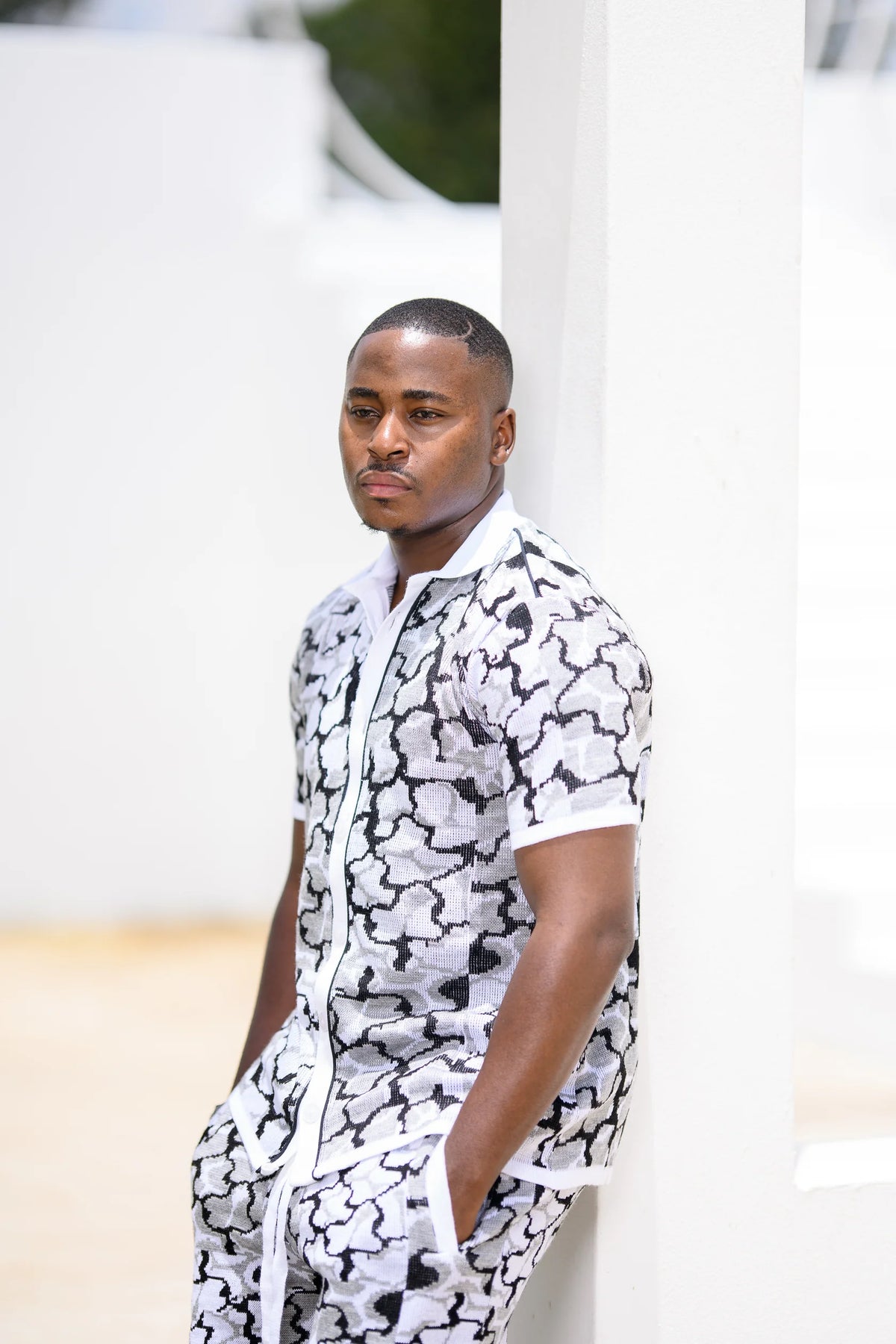 Idayimani _blue golfer knitted shirt_at_unseen_grail._local_brands_south_africa._streetwear._men_and_women.galxboy_bantu._Male model close up look