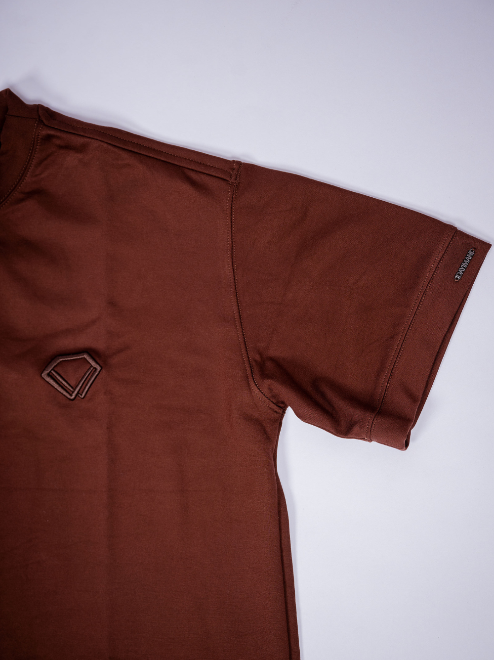 Idayimani _brown T-shirt _at_unseen_grail._local_brands_south_africa._streetwear._women.galxboy_bantu. Side view close up shot