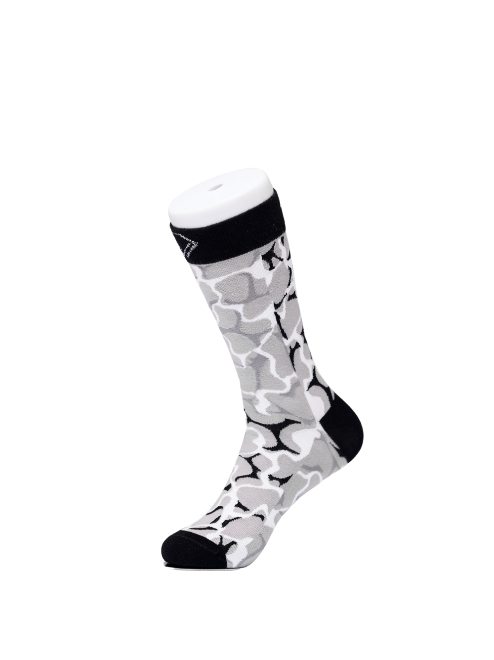 Idayimani _grey_socks_at_unseen_grail._local_brands_south_africa._streetwear._men_and_women.galxboy_bantu._Side view studio shoot