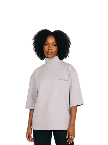 Kai Eleven grey oversized graphic t shirt at unseen grail. local brands south africa. streetwear. men and women. female model front