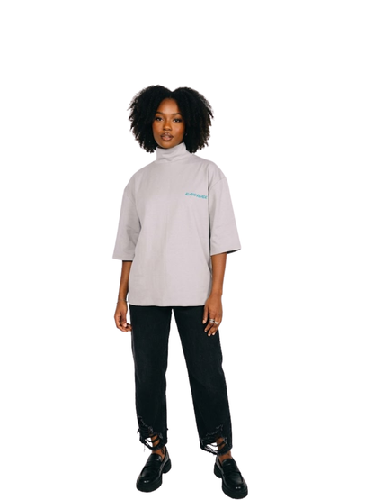 Kai Eleven grey oversized graphic t shirt at unseen grail. local brands south africa. streetwear. men and women. female model front full outfit view