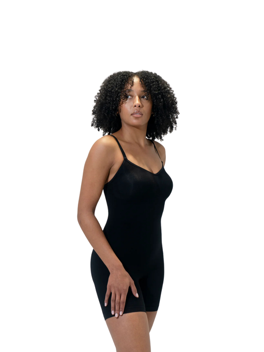 Kurv_black_compression_bodysuit_at_unseen_grail._local_brands_south_africa._streetwear._men_and_women.galxboy_bantu._Female_model_front_shot_half_body