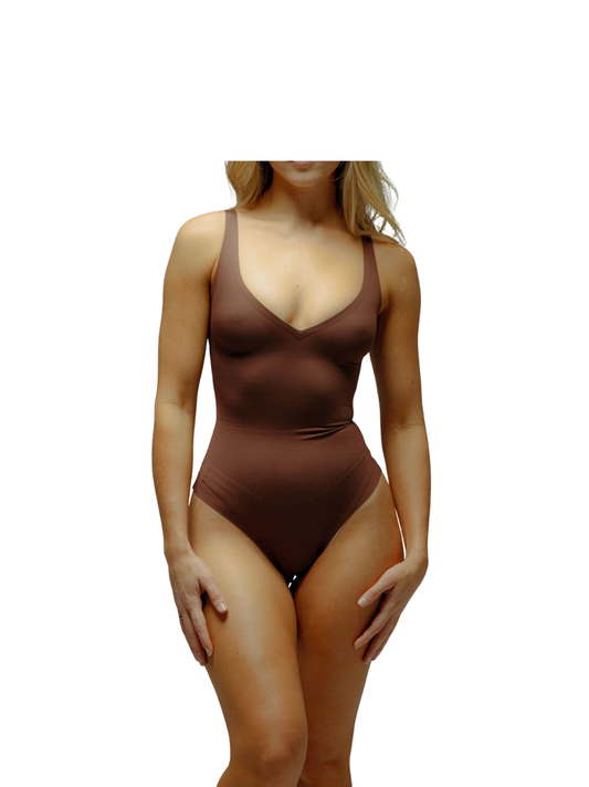 Kurv_brown_body__compression_bodysuit_at_unseen_grail._local_brands_south_africa._streetwear._men_and_women.galxboy_bantu._Female_model_backt_shot_close_up