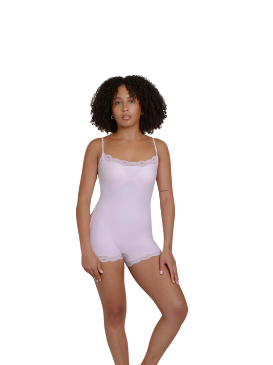 Kurv_pink_lace_bodysuit_at_unseen_grail._local_brands_south_africa._streetwear._men_and_women.galxboy_bantu._Female_model_front_shot_close_up