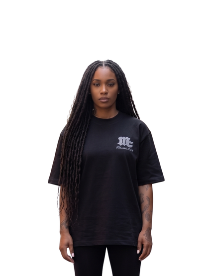 Members club black oversized graphic t shirt at unseen grail. local brands south africa. streetwear. men and women. studio image female model front galxboy, bantu