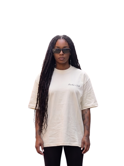 Members club grey oversized graphic t shirt at unseen grail. local brands south africa. streetwear. men and women. studio image female model front