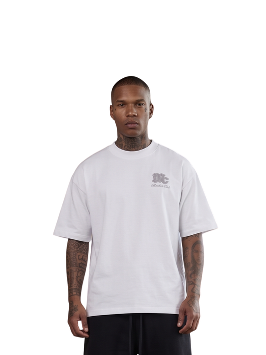 Members club white oversized graphic t shirt at unseen grail. local brands south africa. streetwear. men and women. studio image male model front