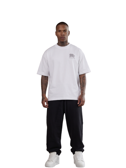 Members club white oversized graphic t shirt at unseen grail. local brands south africa. streetwear. men and women. studio image male model front galxboy, bantu