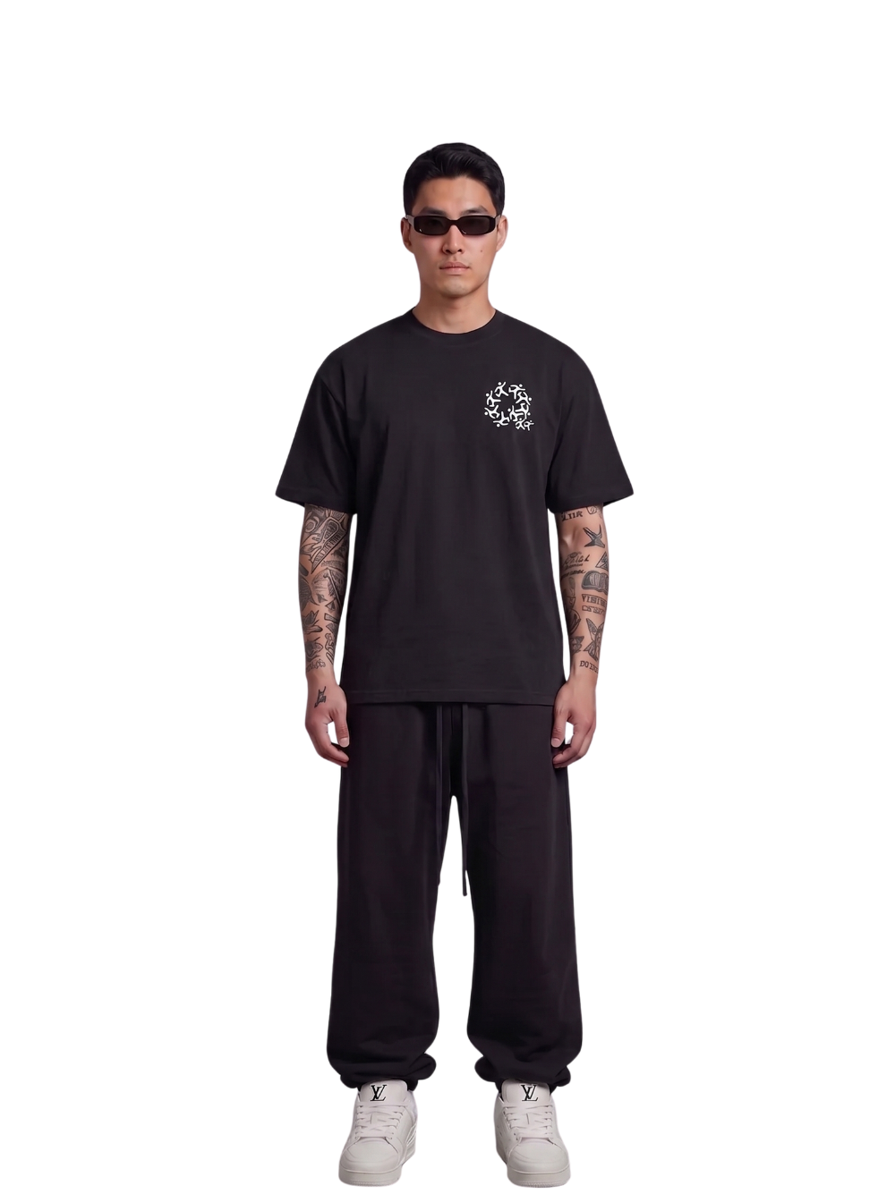 Mercha black oversized graphic t shirt at unseen grail. local brands south africa. streetwear. men and women. studio image front male model full outfit