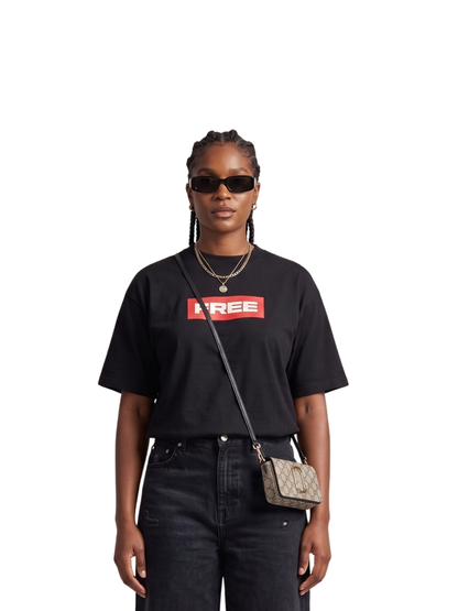 Mercha washed black oversized graphic vest at unseen grail. local brands south africa. streetwear. men and women. studio image nasty c female model