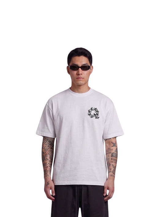Mercha white oversized graphic t shirt at unseen grail. local brands south africa. streetwear. men and women. studio image front male model