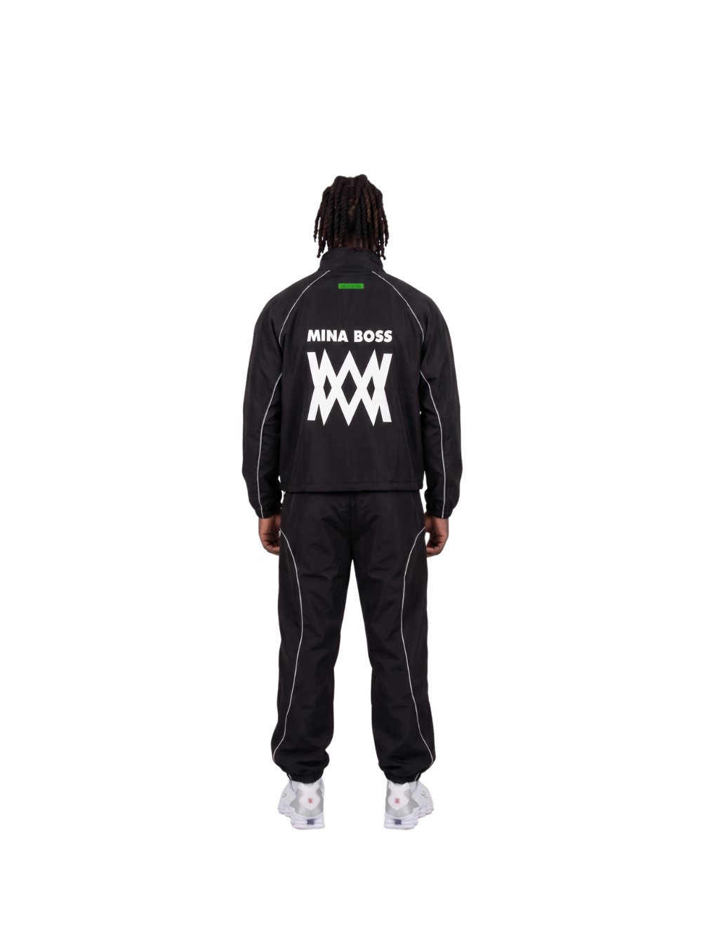 Mina Boss black oversized graphic tracksuit at unseen grail. local brands south africa. streetwear. men and women. studio image front. el patron back image