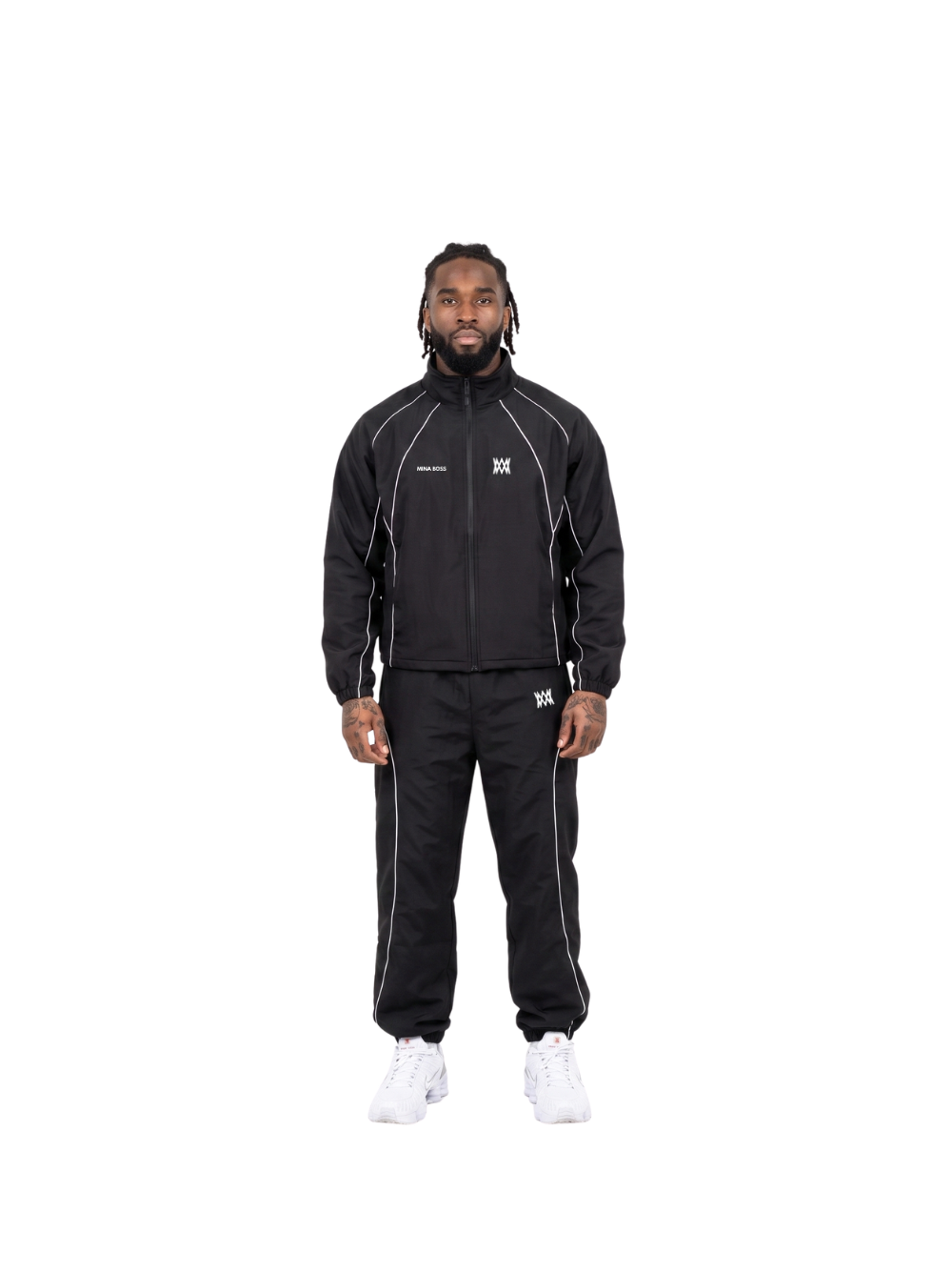 Mina Boss black oversized graphic tracksuit at unseen grail. local brands south africa. streetwear. men and women. studio image male model front