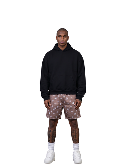 Oversized shorts by Ostentious and unseen grail. graphic shorts. local streetwear brands south africa. female and male.