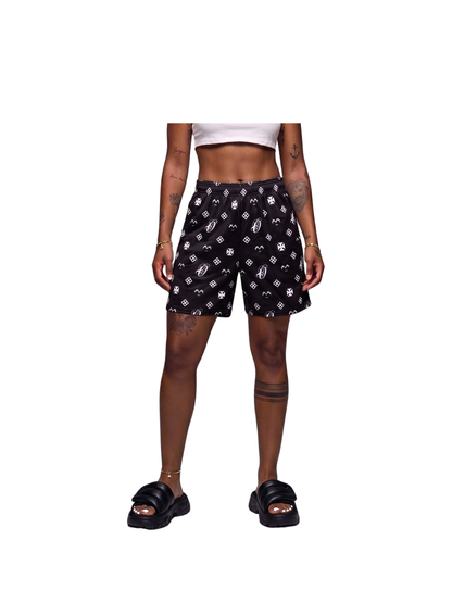 Oversized shorts by Ostentious and unseen grail. graphic shorts. local streetwear brands south africa. female and male.