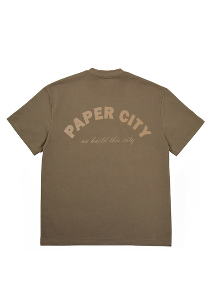 Paper city brown oversized graphic tshirt at unseen grail. local brands south africa. streetwear. men and women. mock up back
