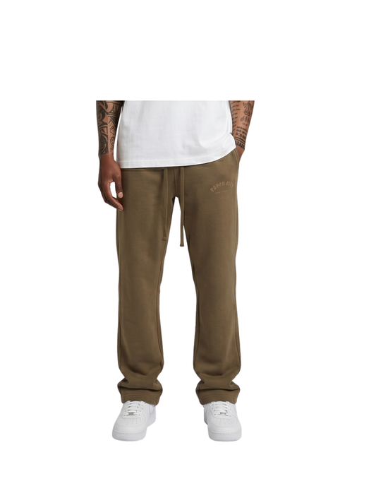 Paper city brown oversized sweatpants  at unseen grail. local brands south africa. streetwear. men and women. male model