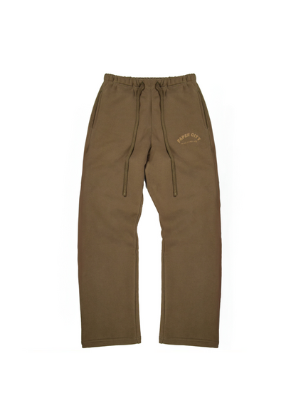 Paper city brown oversized sweatpants  at unseen grail. local brands south africa. streetwear. men and women. mock up front