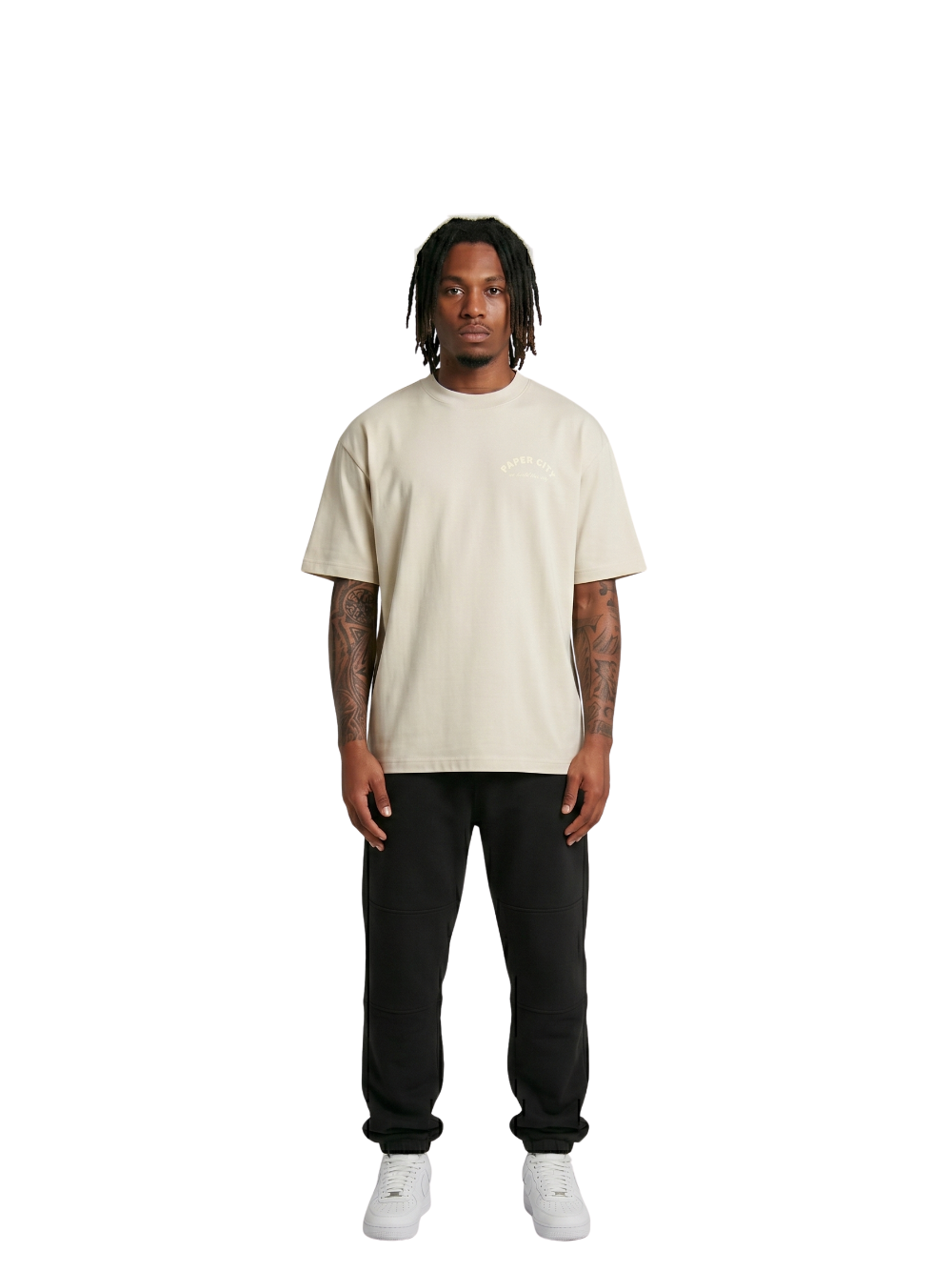 Paper city cream oversized graphic tshirt at unseen grail. local brands south africa. streetwear. men and women. male model front image full outfit