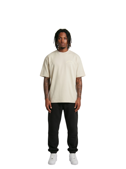 Paper city cream oversized graphic tshirt at unseen grail. local brands south africa. streetwear. men and women. male model front image full outfit