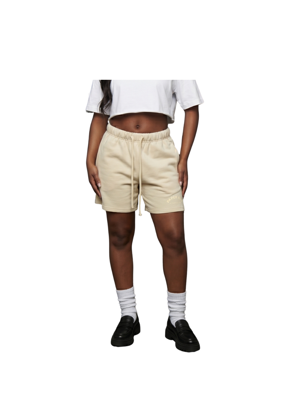 Paper city cream oversized shorts at unseen grail. local brands south africa. streetwear. men and women. female model front