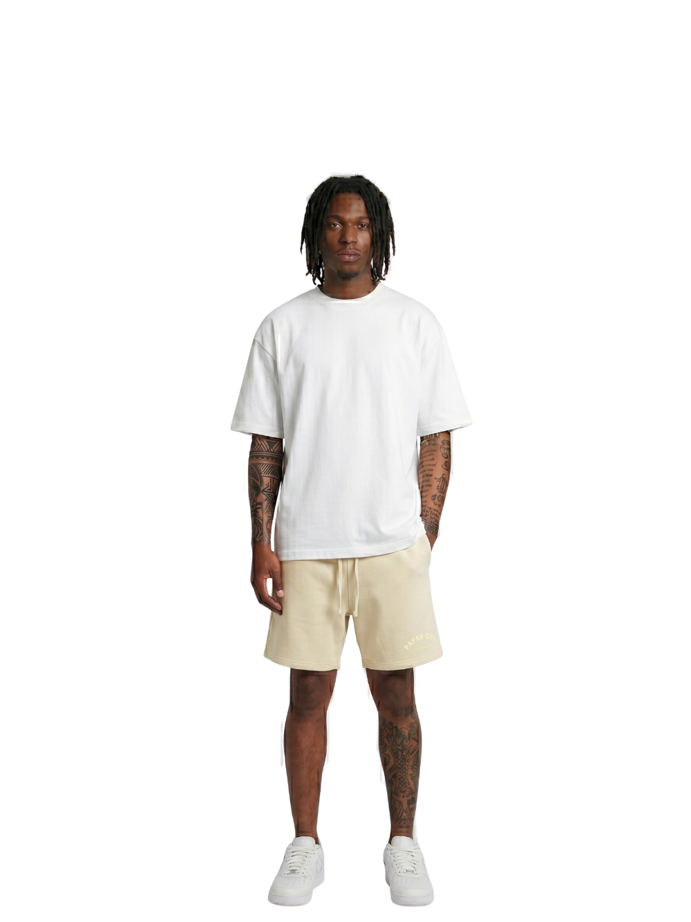 Paper city cream oversized shorts at unseen grail. local brands south africa. streetwear. men and women. male model front full outfit