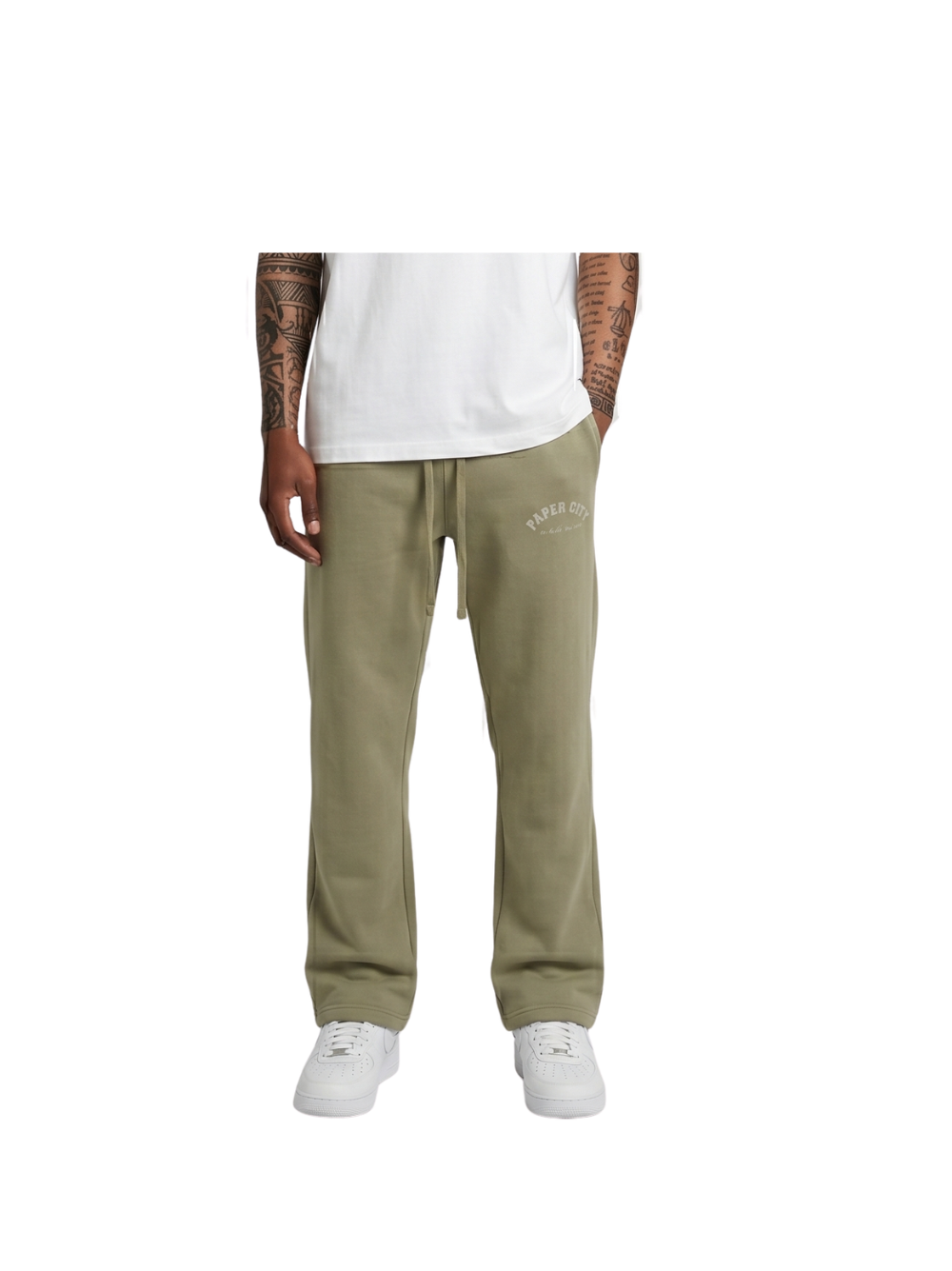 Paper city green oversized sweatpants  at unseen grail. local brands south africa. streetwear. men and women. male model front