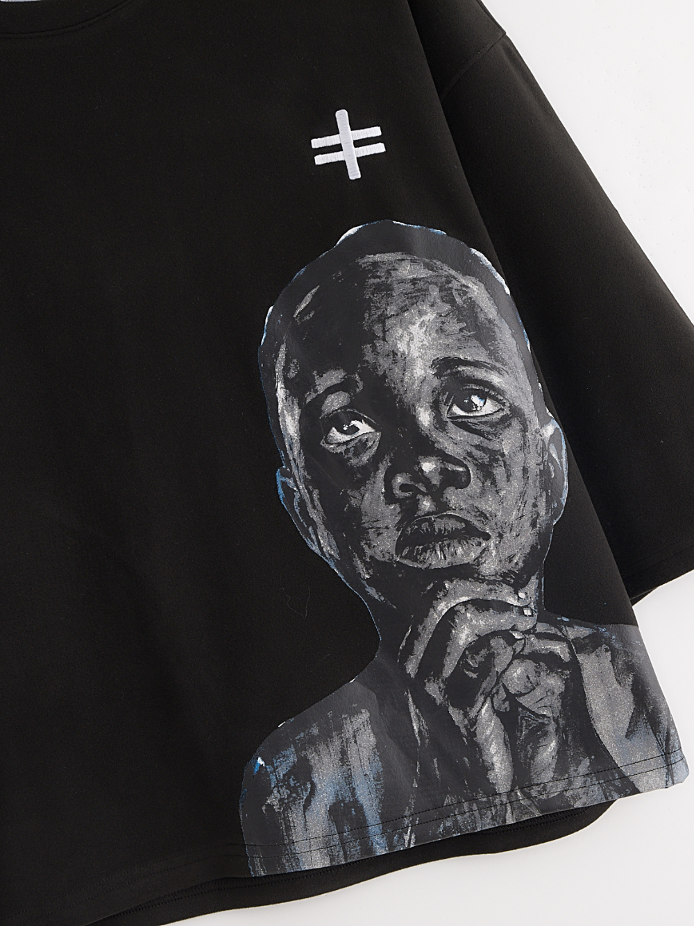 Rare Blaq black oversized graphic t shirt at unseen grail. local brands south africa. streetwear. men and women. flatlay mock close up