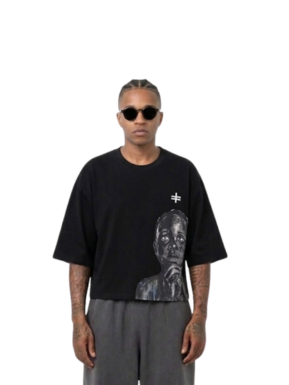 Rare Blaq black oversized graphic t shirt at unseen grail. local brands south africa. streetwear. men and women. male model front view image