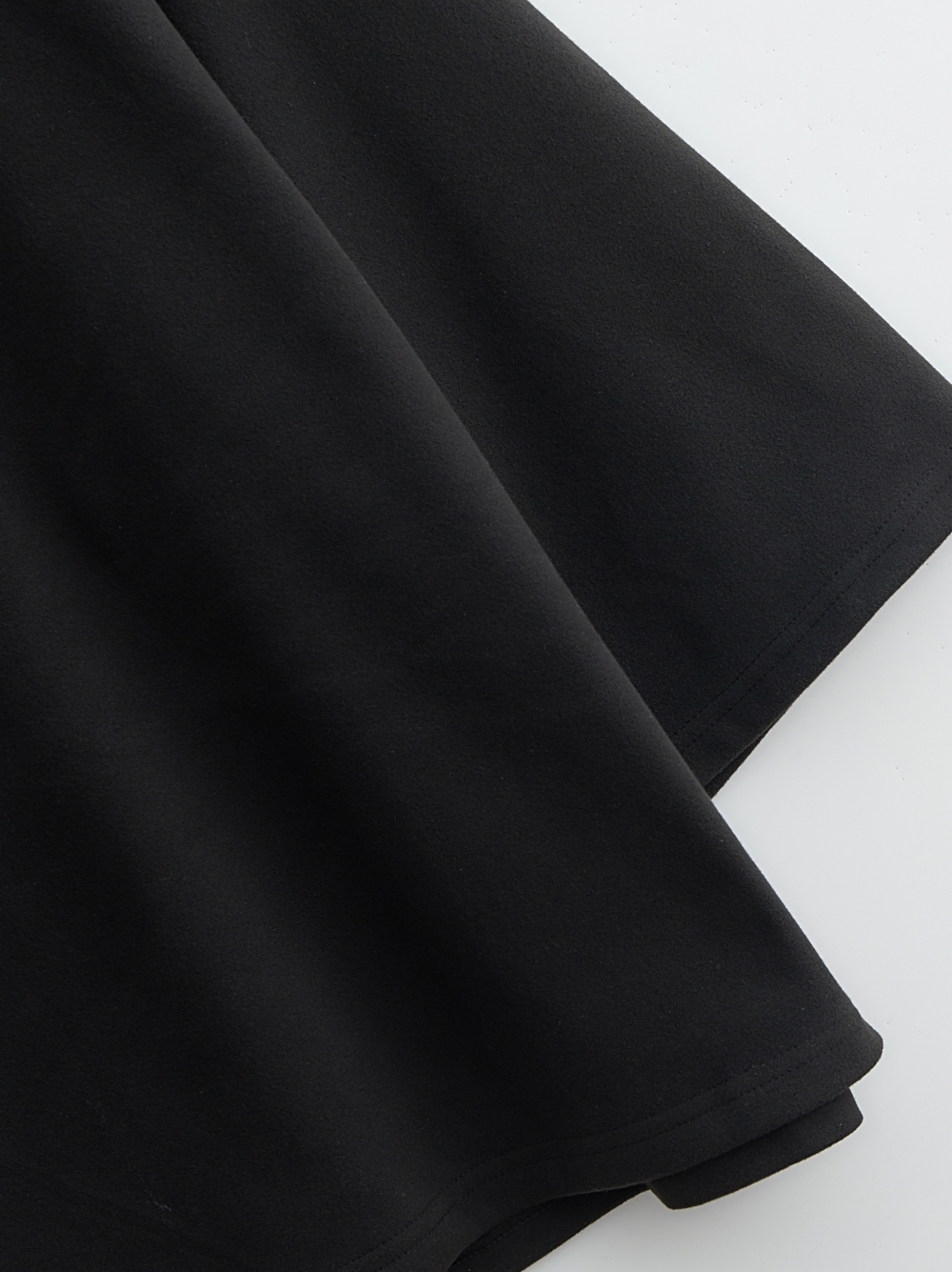 Rare Blaq black oversized graphic t shirt at unseen grail. local brands south africa. streetwear. men and women. studio image close up fabric