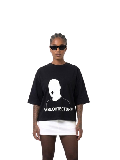 Rare Blaq black oversized graphic t shirt at unseen grail. local brands south africa. streetwear. men and women. studio image female model front