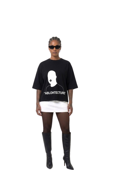 Rare Blaq black oversized graphic t shirt at unseen grail. local brands south africa. streetwear. men and women. studio image female model front full view