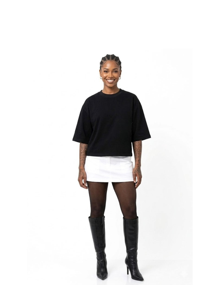 Rare Blaq black oversized graphic t shirt at unseen grail. local brands south africa. streetwear. men and women. studio image female model full front view