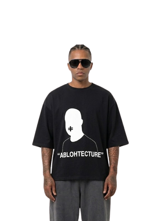 Rare Blaq black oversized graphic t shirt at unseen grail. local brands south africa. streetwear. men and women. studio image male model front