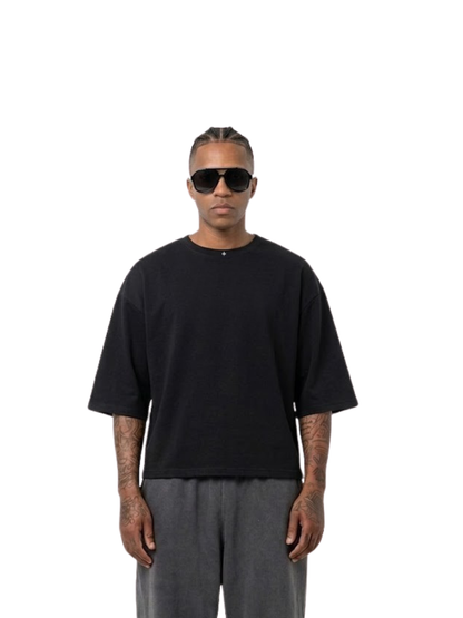 Rare Blaq black oversized graphic t shirt at unseen grail. local brands south africa. streetwear. men and women. studio image male model front view