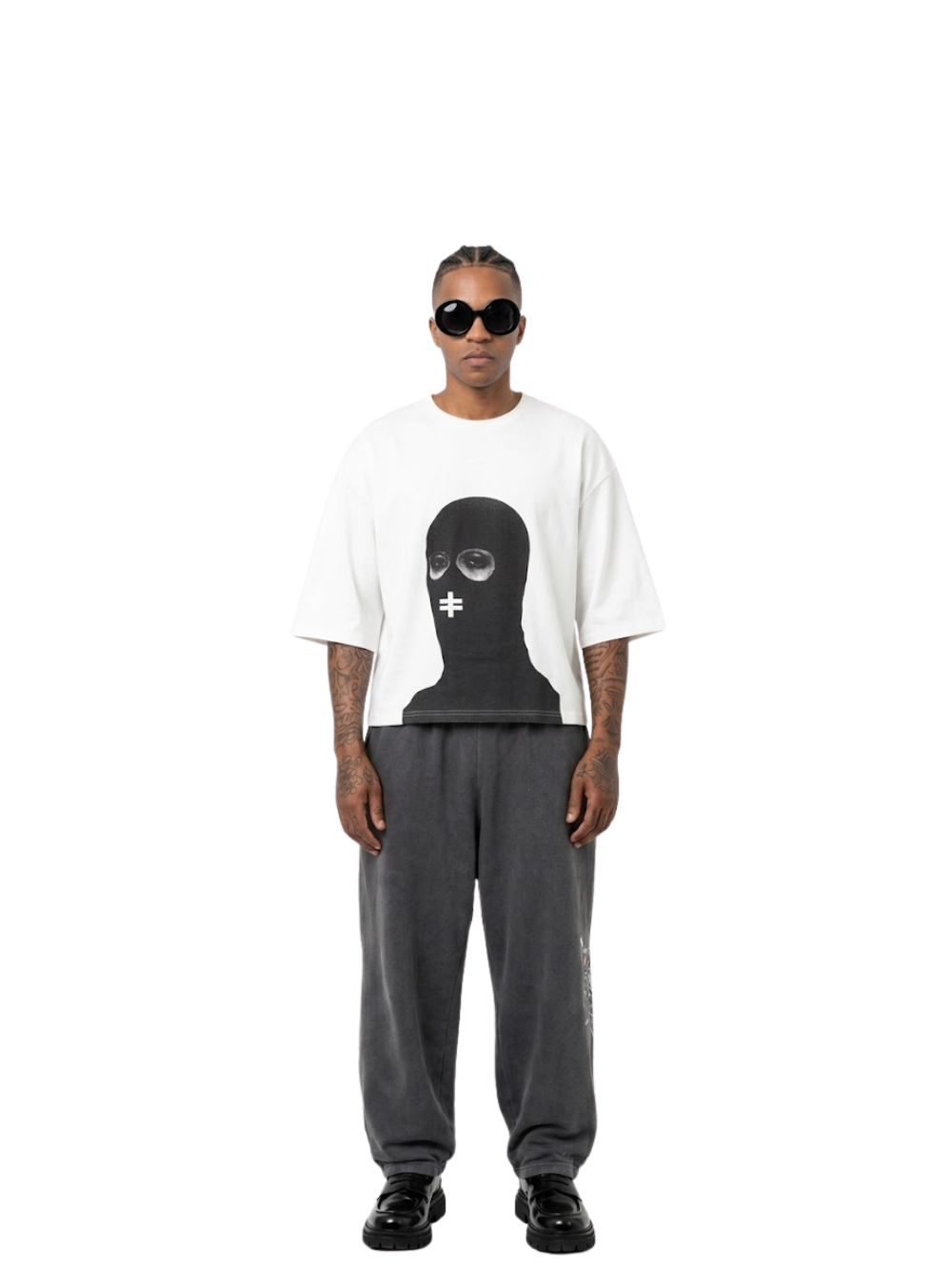 Rare Blaq white oversized graphic t shirt at unseen grail. local brands south africa. streetwear. men and women. studio image male model full outfit front