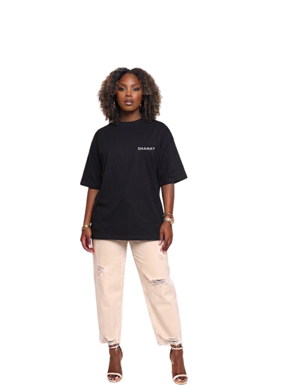 Shanay Davids black oversized graphic t shirt at unseen grail. local brands south africa. streetwear. men and women. studio image female model full outfit. galxboy. el patron. bantu.