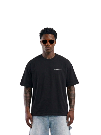 Shanay Davids black oversized graphic t shirt at unseen grail. local brands south africa. streetwear. men and women. studio image full outfit female. galxboy. el patron. bantu