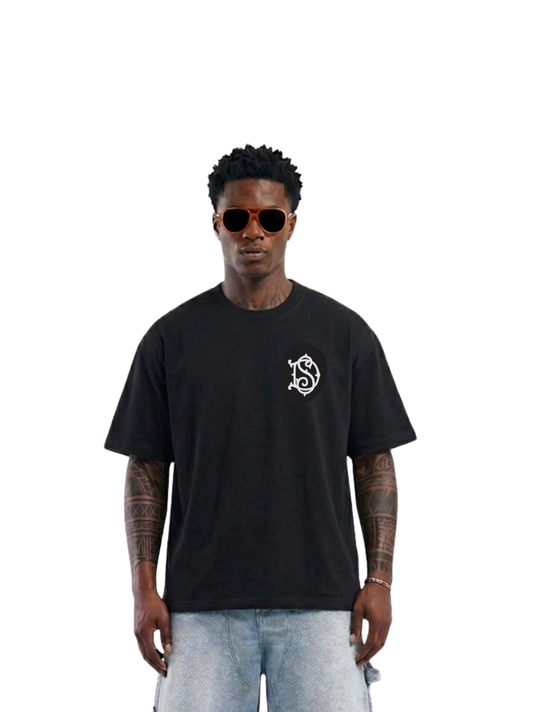 Shanay Davids black oversized graphic t shirt at unseen grail. local brands south africa. streetwear. men and women. studio image male model front. galxboy. bantu.