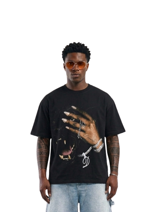 Shanay Davids black oversized graphic t shirt at unseen grail. local brands south africa. streetwear. men and women. studio image male model front