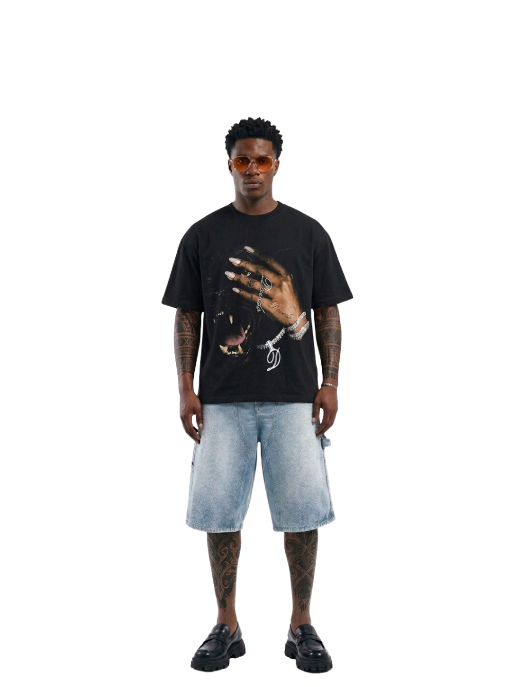 Shanay Davids black oversized graphic t shirt at unseen grail. local brands south africa. streetwear. men and women. studio image male model full outfit