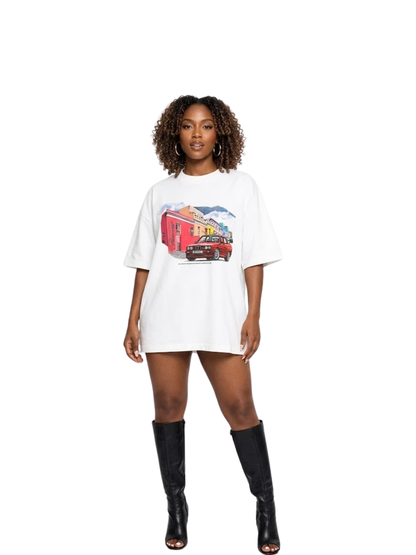 Shanay Davids white oversized graphic t shirt at unseen grail. local brands south africa. streetwear. men and women. studio image female model full outfit
