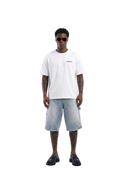 Shanay Davids white oversized graphic t shirt at unseen grail. local brands south africa. streetwear. men and women. studio image full outfit. galxboy. el patron. bantu