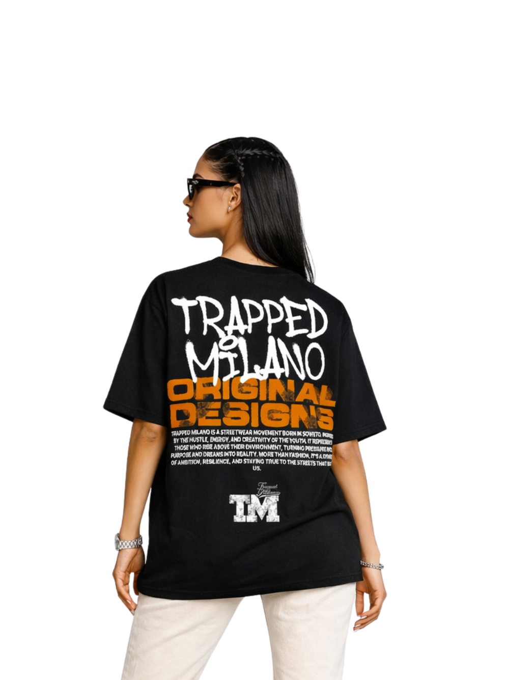 Trapped Milano black oversized graphic t shirt at unseen grail. local brands south africa. streetwear. men and women. studio image female model behind