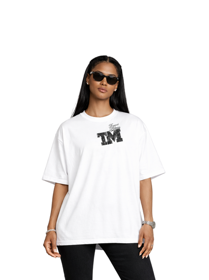 Trapped Milano white oversized graphic t shirt at unseen grail. local brands south africa. streetwear. men and women. studio image female model front